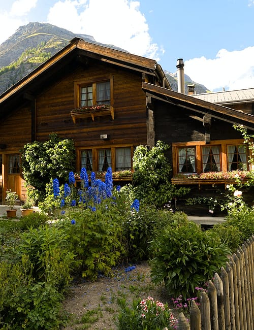 large wooden house in an alpine town